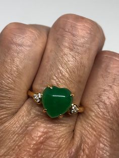 Vintage Lucky Green Nephrite Jade Heart Gold Rhodium Ring https://www.etsy.com/listing/811114030/vintage-lucky-green-nephrite-jade-heart?utm_source=crowdfire&utm_medium=api&utm_campaign=api Vintage Jade Ring, Fine Jewelry Green Heart Ring For May Birthstone, Green Heart Ring For May Birthstone, Fine Jewelry Style, Green Heart Ring For May Birthstone, Fine Jewelry Green Heart Shaped Ring, Green Heart-shaped Fine Jewelry Ring, Green Gemstone Heart Cut Rings, Green Gemstone Rings With Heart Cut, Heart-shaped Green Emerald Ring For May Birthstone