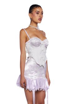 cuz make a statement on the dance floor. This underbust corset top has a linen construction with a satin lining, structured boning, an underwire bust, a satin ribbon lace-up design on the back, adjustable buckle closures on the sides, decorative bows on the front, a curved hem, and a side zipper closure. Sugar Thrillz, Corset Mini Dress, On The Dance Floor, Decorative Bows, Underbust Corset, Pink Sugar, Blue Backpack, Pink Mini Dresses, Dance Floor