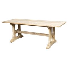 an old wooden table on a white background