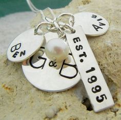 Hand Stamped Family Necklace Custom Personalized by ERiaDesigns, $48.00  I really like this! Elegant Personalized Charms As A Gift For Mom, Personalized Silver Jewelry As A Gift For Mom, Silver Name Jewelry - Gift For Mom, Silver Name Jewelry As Gift For Mom, Sterling Silver Charm Necklace For Mother's Day, Everyday Sterling Silver Name Necklace With Birthstone, Silver Charm Necklaces For Birthday And Mother's Day, Personalized Silver Charm Necklace For Mother's Day, Stamped Charm Necklace For Mother's Day