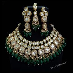 Designer elegant kundan necklace set handcrafted with premium kundans & cat eye beads > Premium quality kundan with back meenakari > For any colour customization please message us Inspired By Sabyasachi Wedding Kundan jewelry Such intricate detailing in this Inspired Heritage Royal Set with Green Emerald drops and Flawless Polki and Diamond work. This set will surely make heads turn .. Finest Kundan work . Emerald Green Bridal Jewelry Indian, Bridal Choker Set, Bridal Jewellery Inspiration, Kundan Jewellery Bridal, Kundan Jewellery Set, Kundan Choker, Bridal Choker, Bridal Necklace Set, Indian Necklace