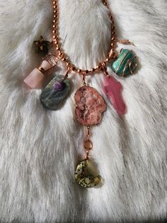 💚 I have some  Beautiful Natural Crystal Pendant Charm necklaces that i customize on a variety of necklaces including  Copper chain Necklaces, Cords necklaces, silver & gold (depending on your preference). All crystal charms will have amazing healing energy that helps balance and align your Chakras. Perfect gift for mom on mothers day, family, friends or just because  For a different Crystal Charm Necklace, message me your bday & 2 to 3 favorite colors along with picking options of how many cry Handmade Spiritual Dangle Charm Necklaces, Handmade Spiritual Metal Charm Necklaces, Unique Handmade Dangle Charm Necklaces, Unique Dangle Charms Necklace, Unique Dangle Necklaces With Charms, Handmade Spiritual Charms As Gifts, Bohemian Personalized Charm Necklace Pendant, Bohemian Personalized Charm Pendant Necklace, Personalized Bohemian Charm Necklace With Pendant