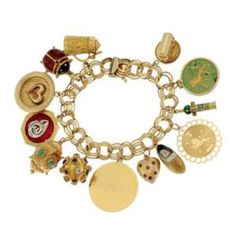 This is a large 13 charms chain bracelet, it is crafted from 14k and 18k yellow gold featuring large and small assorted shape charms dangling from a triple ring chain bracelet. The turquoise fob, sputnik are 18k yellow gold, some coins are hallow puffed heart, flat medallion, beer tankard, ladybug and more!  The bracelet is 14k yellow gold and it secures with a slide clasp, comes with a latch for added security has the 14k gold content stamp.  Material:  14k and 18k yellow gold and enamel Gemsto Vintage Collection Gold Bracelets With Charms, Vintage Gold Charm Bracelet With Dangling Charms, Vintage Gold Charm Bracelet Luxury, Vintage Yellow Gold Charm Bracelet, Ring Chain Bracelet, Luxury Metal Charm Bracelet With Vintage Charm, Gold-tone Metal Charm Bracelet With Vintage Charm, Triple Ring, Ring Chain