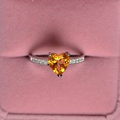 This is a gorgeous handmade creation. Its beauty is its simplicity & Elegance. The 8 mm heart cut faceted natural citrine is crafted in solid sterling silver and with rhodium plated. All item is sent in a beautiful gift box You can realize more lovely stuff clicking the link https://www.etsy.com/shop/knightjewelry?refshopsection_shophome_leftnav Please leave the correct address and you phone number for delivering successfully. Heart Cut Topaz Jewelry Perfect For Gifts, Heart Cut Topaz Jewelry For Gifts, Heart Cut Topaz Jewelry Gift, Heart Cut Topaz Jewelry As Gift, Silver Heart Cut Topaz Ring Gift, Heart Cut Silver Topaz Ring For Gift, Heart Cut Topaz Gemstone Jewelry, Heart Cut Topaz Gemstone Ring For Promise, Sterling Silver Heart Cut Topaz Promise Ring