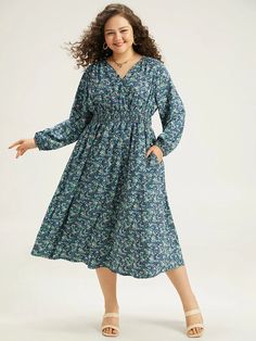 Ditsy Floral Wrap Shirred Pocket Lantern Sleeve Dress – BloomChic Casual Patterned Floral Print Midi Dress, Casual Patterned Midi Dress With Floral Print, Casual Ditsy Floral Print Midi Dress For Fall, Casual Midi Dress With Ditsy Floral Print For Fall, Casual Midi Dress With Ditsy Floral Print, Casual V-neck Dress With Ditsy Floral Print, Casual Long Sleeve Floral Dress For Fall, Casual Long Sleeve Ditsy Floral Dress, Casual Fall Midi Dress With Floral Print