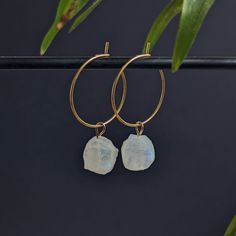 ✨ Golden, waterproof stainless steel hoop earrings with small, raw rainbow moonstones. ✨ Each moonstone is lovingly handcrafted into a pendant and finally a high-quality hoop earring. The size of the gemstones varies between 8-10 mm. Since these are natural stones, no two crystals are the same, each one is unique. ♥ The diameter of the hoop earrings is 2 cm. The hoop earrings are simply hooked together for easy opening and closing. 2 pieces per sale. ☼ To charge your crystal it can be placed in Golden Hoop Earrings, Golden Hoops, Crystal Hoop Earrings, Jewelry Crystal, Moonstone Earrings, Moonstone Jewelry, Jewelry Earrings Hoops, Moon Stone, Rainbow Moonstone