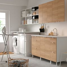 a laundry room with washer and dryer in it