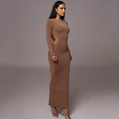 Features: Stay stylish and comfortable this autumn and winter with our Hollow Out Contrast Color Bodycon Maxi Dress for Women. With a new O neck design, long sleeves, and a sexy side split, you'll turn heads wherever you go. Made with high-quality materials, this dress is perfect for any occasion. Fitted Long Sleeve Bodycon Dress With Side Slits, Long Sleeve Bodycon Dress With Thumbholes, Bodycon Long Sleeve Dress With Thumbholes, Long Sleeve Bodycon Dress With Side Slits For Evening, Long Sleeve Bodycon Dress For Club, Long Sleeve Stretch Bodycon Dress With Side Slits, Stretch Long Sleeve Bodycon Dress With Side Slits, Stretch Bodycon Dress With Side Slits And Long Sleeves, Winter Long Sleeve Bodycon Dress For Club