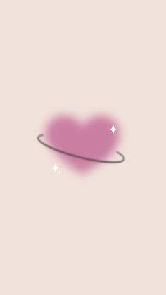 a pink heart shaped object with stars in the background