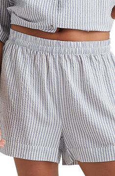 Lightweight cotton-blend seersucker lends breezy comfort to these pajama shorts covered in neat stripes. 3 1/2" inseam; 28" leg opening; 13" front rise; 15" back rise (size Medium) Elastic waist Side-seam pockets 50% cotton, 50% Lenzing™ EcoVero™ viscose Lenzing EcoVero viscose is a more-sustainably produced fiber made using pulp made from renewable wood sources Machine wash, line dry Imported