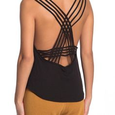 A Strappy Racerback Looks Ultra-Chic On This Sleeveless Valentine Casual Tank Top. - Crew Neck - Sleeveless - Strappy Racerback - Ribbed Trim - Knit Construction Shell: 50% Polyester, 25% Rayon, 25% Cotton Rib: 55% Cotton, 35% Polyester, 10% Rayon Black Tank Top With Built-in Bra And Strappy Back, Casual Tank Top With Built-in Bra And Strappy Back, Black Top With Built-in Bra And Strappy Back, Black Tops With Built-in Bra And Strappy Back, Summer Cross Back Tank Top With Straps, Stretch Tank Top With Cross Back Straps, Cross Back Tank Top With Straps For Workout, Cross Back Tank Top For Workout, Chic Black Strappy Back Halter Top