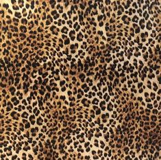 an animal print pattern is shown in brown and black