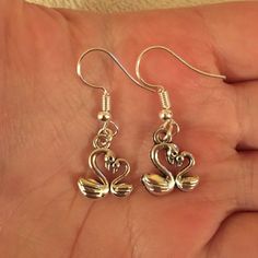 Silver plated dangle/ drop earrings with swan charms 925 stamped sterling silver earring hooks also available Comes in an organza bag 💫💫 Swan Earrings, Swan Jewelry, Earring Hooks, Silver Earring, Organza Bags, Sterling Silber, Sterling Silver Earrings, Jewelry Earrings Dangle, Silver Plate