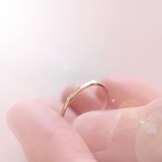 Introducing the original Dainty Ring - a must-have for every ring stack! Made from 14k yellow gold, this ring is both delicate and chic. Wear it alone for a minimalist look or stack it up to create a personalized set. Handcrafted with care, each ring is unique, showcasing its own rustic character. Measuring 1mm in width, this ring is the perfect addition to your jewelry collection. • Please note that Amy will need two weeks to create your ring with utmost attention to detail. Everyday Yellow Gold Initial Ring With Round Band, Dainty Yellow Gold Initial Ring For Everyday, Dainty Everyday Initial Ring With Round Band, Dainty Initial Ring With Round Band For Everyday, Dainty 14k Gold Stackable Initial Ring, Dainty Initial Ring With Round Band, Dainty Diamond Cut Open Band Rings, Dainty 14k Gold Initial Ring With Round Band, Dainty Open Band Rings With Diamond Cut