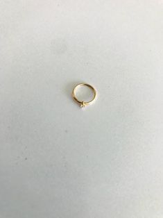 14K Yellow Gold, Hoop with Cubic ZC Nose Ring, Yellow Gold Nose Ring, Hoop Nose Ring ♦ Materials: 14K Gold ♦ Available colors: Yellow Gold ♦ Hoop Measurements: 9 Millimeters Diameter ♦ Cauge Thickness: 20G ♦ Cubic ZC Size: 1.5 Millimeter ♦ Stamped: 14K PLEASE REFER TO THE ACTUAL DIMENSIONS. WE HAVE ENLARGED THE PICTURES FOR A BETTER VIEW-------------------------------------------------- ♦ --------------------------------------------------MATERIALS14K GoldPRODUCTION TIMESOrder processing time var Gold Nose Ring Hoop, Hoop Nose Ring, Nose Ring Hoop, Gold Nose Ring, Gold Nose Rings, Nose Rings Hoop, Circle Studs, Flower Studs, Gold Flowers