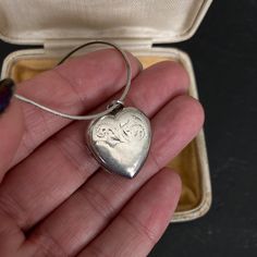 Beautiful 1970s VINTAGE SILVER Locket on a sterling silver 18 inch Snake Chain. A lovely heart shaped Sterling Silver Engraved Pendant Necklace. 70s Vintage Silver Jewelry offered by Isobel Vintage Jewels on Etsy Style: Vintage 1970s real silver locket. A lovely heart 70s side opening sterling silver locket big enough for putting little photos inside.  Colour: silver  Size: 2 x 2cm and 18 inch snake chain Condition: Excellent condition Approximate Date: 1970s Check out my other lovely silver ite 70s Accessories, Pendant Necklace Vintage, Vintage Silver Jewelry, Sterling Silver Locket, Engraved Pendant, Silver Locket, Silver Lockets, Lovely Necklace, 70s Vintage