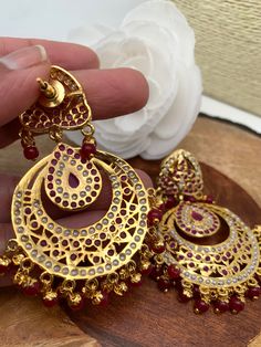 Hyderabadi Jadau Pearls Red Stone Chandbali EarringsColor : GoldenSize : Earring Length : 3 Inches; Weight : 17 Grams Each;Stones : Red Stone Pearls Chandbali Earrings, Traditional Earrings, Red Stone, Social Events, Indian Jewelry, Stone, Red