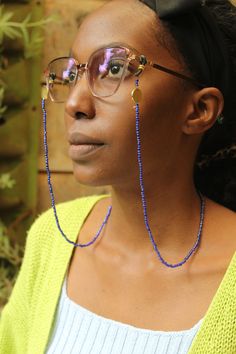 Handmade in Kenya! Crafted with seed beads and brass pendants.   Included eyeglass loops that can attach the chain to your eyeglasses or sunglasses 36 cm approx.(folded) SHIPPING Shipping is done via DHL Express, 3-7 days delivery, Add multiple items to your cart and pay shipping for one item ONLY! Adjustable Trendy Beads, Trendy Adjustable Beads, Trendy Gold Beads For Summer, Gold Beaded Chain For Summer, Trendy Blue Glass Necklace, Trendy Jewelry With Beaded Chain, Trendy Round Beaded Chain Jewelry, Trendy Summer Beaded Chain Beads, Trendy Round Glass Jewelry