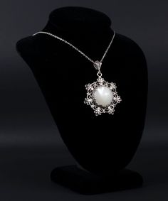 "This beautifully handcrafted filigree art daisy flower pendant feature with Mother of Pearl, Rose Quartz, Blue Abalone or Amethyst gemstones. Exquisitely crafted, handmade flower pendant necklace would be your perfect option for anniversary, birthday, thanksgiving or Christmas gift for yourself or loved one.  For gold plated option, visit that link; https://www.etsy.com/FiligranUSA/listing/1401924202 The optional silver chain length is 18.00\" (45.7 cm)  + 2.00\" (5.10 cm) extension.  All gemstones` diameter is 16 mm, cabochon round-cut.  This metal embroidery filigree pendant is oxidized and highly polished. Comes with a velvet pouch, silver polish cloth and a luxurious gift box. What is Filigree Art? Filigree is made of delicate metal strands that have been skillfully fashioned to creat Exquisite Gemstone Flower Pendant Necklace, Exquisite Pearl Pendant Jewelry, Wedding Jewelry With Large Flower Pendant, Elegant Flower-shaped Large Pendant Jewelry, Elegant Flower Shaped Large Pendant Jewelry, Exquisite Flower Shaped Jewelry, Elegant Floral Large Pendant Jewelry, Wedding Necklaces With Oval Cabochon Pendant, Fine Jewelry Wedding Necklace With Cabochon