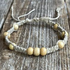 This hemp bracelet / anklet is made using 100% natural hemp cord. Designed for everyday wear.  It has an adjustable closure that will fit a 7-7.5 regular fit wrist. It also opens to around 13 inches to fit as anklet. Casual Handmade Bracelets For Meditation, Handmade Casual Braided Bracelets For Meditation, Adjustable Braided Bracelets With Round Beads In Hippie Style, Adjustable Natural Jewelry With Wooden Beads, Adjustable Sand-colored Bohemian Jewelry, Adjustable Natural Wooden Bead Jewelry, Adjustable Beaded Holistic Bracelets, Adjustable Bohemian Sand-colored Jewelry, Adjustable Natural Wooden Beaded Jewelry