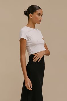 The perfect high waist pant companion. The Kelly Crop Slim Fit Tee is a nostalgic silhouette cut in our anything-but-basic cotton rib. Featuring a crew neckline, a just right cropped length, and clean, tailored finishing. Silhouette Cut, Workout Tee, High Waisted Pants, Crew Neckline, Scoop Neck, High Waist, Slim Fit, High Waisted, Crop Tops