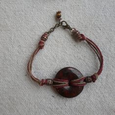 Red Stone Donut Wrapped In Red And Natural Hemp And Antique Bronze Accents. Adjustable Length With Antique Bronze Lobster Claw Clasp. Earthy Adjustable Red Jewelry, Adjustable Earthy Red Jewelry, Earthy Red Adjustable Jewelry, 00s Style, Hemp Bracelet, Hemp Jewelry, Hemp Bracelets, Brown Jewelry, Jewellery Handmade