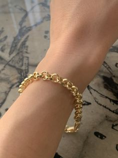 5.5 grams Bracelet lengt: 9 inches Bracelet width: 0.40 14K Gold Thick Chain Bracelet Let's Stay Connected FOLLOW ME ON INSTAGRAM FOR SPECIAL DEALS AND GIVEAWAYS Instagram Link : https://www.instagram.com/noiconejewellry/ ABOUT US I founded Noicone Jewellery, Istanbul based jewellery brand, in 2020. Why? Because, I wanted to make something unique, innovative, creative, permanent, and fascinating.  I tried to gather my ambitions, ideas, skills at the same place. I wanted to share my style, creativity, and vision with a big audience and I tried to make all of these in my brand. I have tried to bring together every product I sell in this brand with my hands and mind in a common way and present them all in a way that is unique and unique in the world. My only goal here is to make the people wh Minimalist Oval Bracelets For Everyday Wear, Minimalist Oval Jubilee Bracelet, Oval Bracelet With Adjustable Chain For Everyday, Oval Adjustable Chain Bracelet For Everyday, Minimalist Oval Chain Bracelet Gift, Minimalist Tarnish Resistant Oval Bracelets, Everyday Oval Gold Chain Bracelet, Minimalist Oval Cable Chain Bracelets, Minimalist Oval Bracelets With Cable Chain