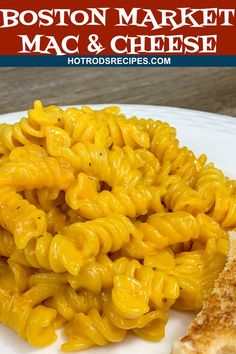 a white plate topped with macaroni and cheese