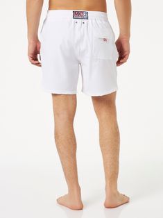 Man comfort swim shortsWhite solid color with St Barth contrast writingMid lengthDrawstring fasteningTrue to sizeComposition: 90%PL 10%EA White Swimwear With Built-in Shorts For Beach Season, White Swim Trunks With Built-in Shorts, Sporty White Shorts With Short Inseam, White Swimwear With Built-in Shorts For Swimming, White Athletic Shorts With Built-in Shorts, Relaxed Fit, White Summer Bottoms For Pool, White Bermuda Bottoms For Beach, White Short Swim Trunks For Beach Season, Casual White Swimwear With Built-in Shorts