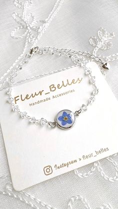 Thank you for visiting Fleur_Belles! ✨💙This Forget Me Not bracelet is linked with Clear Quartz Crystal. They are so gorgeous💙✨  Chain length: 14 chain with 5cm extender Pendant size: 1cm x 1cm 🌺Due to the handmade nature of this product, slight variations may occur, however, the design remains as similar as possible. 💖CARE about the handmade accessories 💖 Please keep in a dry place and avoid prolonged direct sunlight, water, chemicals and perfumes to maintain and preserve the beauty. Silver Flower Crystal Bracelet For Gift, Forget Me Not Bracelet, Blue Nickel-free Crystal Bracelet Gift, Bracelets Christmas, Forget Me Not Resin Jewelry, Spring Flower-shaped Adjustable Crystal Bracelet, Forget Me Not Flower, Christmas Gift For Her, Gold Plated Bracelets