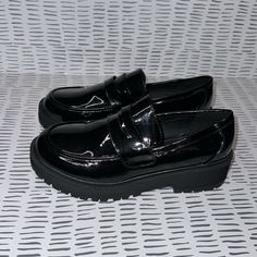 Black Vinyl Material New. Never Worn. Black Synthetic Platform Loafers For Spring, Spring Black Synthetic Platform Loafers, Casual Platform Loafers For Fall Parties, Trendy Black Synthetic Platform Loafers, Black Platform Slip-on Loafers For Spring, Black Slip-on Platform Loafers For Spring, Casual Platform Loafers With Round Toe For Party, Black Spring Loafers, Casual Platform Loafers For Spring Party