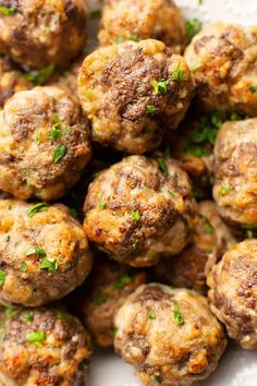 closeup of meatballs with herbs on top