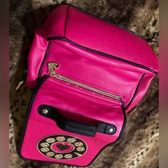 Gorgeous Betsey Johnson Telephone Pocketbook With Attached Adjustable Strap, 2 Inside Pockets & Zipper Compartment. Brand New***Without Tags! Approx. L” Is 8” Across, H Is 9”(Not Counting Straps), 4.5 Diameter Inside. From Nonsmoking Home. ***Backside Has Some Pink Trim Coming Undone Above The Outside Zipper. Unique Pocketbook From Betsey Johnson Is Vintage-No Tags-Never Used! Pink School Satchel With Detachable Strap, Trendy Pink Satchel With Mobile Phone Bag, Trendy Pink Satchel With Phone Bag, Retro Pink Shoulder Bag For Daily Use, Pink Mobile Phone Shoulder Bag For School, Pink Satchel For School, Chic Pink Satchel For School, Chic Pink School Satchel, Retro Pink Satchel Shoulder Bag