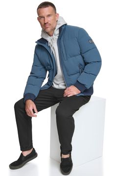 Stretch fabric and a quilted body mean all-day comfort in a versatile jacket. 27" length Stand collar Water-resistant Lined, with 50% down, 50% feather fill 88% nylon, 12% spandex Machine wash, tumble dry Imported Versatile Jacket, Quilted Jacket, Stand Collar, Stretch Fabric, Water Resistant, Nordstrom, Spandex, Collar, Water