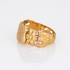 Finely detailed antique Victorian shield signet ring (circa 1880s to 1900s), crafted in 18 karat yellow gold.   The centre shield is engraved with the initials "FH".   The side shoulders feature a pretty floral design, terminating to the shield mount. The saddle of the ring is low and curves to the shape of the finger.     The ring is in good condition with patina and wear evident. We have not cleaned the ring in order to preserve the patina and collector value.    Particulars:  Weight: 6.6 gram Victorian 14k Gold Engraved Ring, Victorian Style Gold Engraved Oval Ring, Gold Oval Victorian Engraved Ring, Gold Victorian Engraved Oval Ring, Antique Engraved Signet Ring For Ceremonial Occasions, Antique Gold Oval Initial Ring, Heirloom Yellow Gold Engraved Dome Ring, Vintage Yellow Gold Engraved Dome Ring, Victorian 14k Stamped Ceremonial Signet Ring