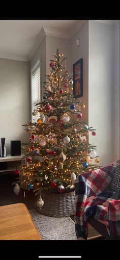 a decorated christmas tree in a living room