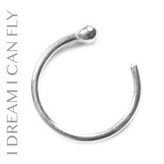 "This open nose ring is made from nickel free solid 18K palladium white gold. Simple and easy to wear, this is the perfect nose ring for those of you who have to take your nose ring out for work or play. Insert it from the inside and spin it around and it looks just like a seamless ring. No more fumbling and bending on a daily basis! Sizing is by internal diameter (ID), which is the standard sizing used in the body jewelry industry. Please be sure to buy the correct size hoop for your unique pie The Perfect Nose, Unique Pies, Perfect Nose, Gold Nose Rings, Piercings Unique, Nose Hoop, Nose Rings, Nose Ring Stud, Cartilage Piercing