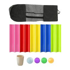 an assortment of different colored plastic objects including a bag, balls, and tees