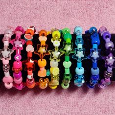 Phone straps: https://www.etsy.com/WLOBeauty/listing/1319932777 Custom kandi: https://www.etsy.com/WLOBeauty/listing/1390537714/ ♥ Please note Due to their handmade nature, these accessories will vary from piece to piece. These bracelets are randomized & I take artistic liberties with each bracelet. Same color pallets will be used. ♥ Sizing To know which length to choose, measure around your wrist with a tape measure. I'd recommend rounding UP to the nearest inch to ensure a comfortable fit. If Scene People, Bracelets Kandi, Bracelets Purple, Pulseras Kandi, Neon Rave, Diy Kandi Bracelets, Pony Bead Bracelets, Kawaii Y2k, Diy Kandi