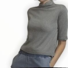 The Temple Top By Mod Ref In Grey Is A Lightweight Top With A 3/4 Sleeve And Cowl Neck For Everyday Wear. 35% Acrylic, 30% Cotton, 30% Rayon, 5% Spandex Trendy Half Sleeve Tops For Day Out, Gray 3/4 Sleeve Summer Top, Gray 3/4 Sleeve Top For Summer, Gray Summer Top With 3/4 Sleeves, Half Sleeve Tops For Fall Day Out, Casual Gray Tops With 3/4 Sleeve, Solid Color Tops With 3/4 Sleeve For Day Out, Fitted Half-sleeve Tops For Spring, Basic Spring Workwear Tops