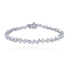 This stunning 14K Solid Gold Multi Shape White Topaz Tennis Bracelet, is crafted to perfection with a sophisticated mix of multi-shaped white Topaz gemstones. This luxury tennis bracelet exudes glamour and style, making it the perfect accessory to elevate any outfit, whether attending a special event or adding a touch of sparkle to your everyday look.Each white topaz gemstone is carefully set in a sleek 14K solid gold framework, creating a seamless flow of brilliance. The unique combination of r White Tennis Bracelet With Baguette Diamonds, White Baguette Diamond Tennis Bracelet, Modern White Diamond Cut Bracelet, White Diamond Baguette Cut Bracelet, Luxury White Diamond Baguette Cut Bracelet, Luxury White Baguette Cut Diamond Bracelet, Elegant White Baguette Cut Tennis Bracelet, Modern White Jubilee Tennis Bracelet, White Diamond Bracelet With Baguette Diamonds For Anniversary