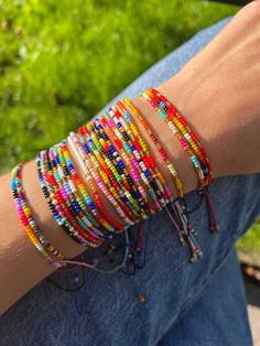 Beaded bracelets for women, handmade with love by indigenous communities in Colombia - they believe that wearing a piece is like carrying a part of the universe :) ❥ PICK YOUR SET OF 2 Pick your two favourite bracelets and select the corresponding numbers when placing your order. ❥ DIMENSIONS Bracelets are adjustable to every size with a sliding knot. Check out more ethnic bracelets in our shop: https://www.etsy.com/shop/IluminaCamino?ref=seller-platform-mcnav&section_id=25291255 ❉ ❉ ❉ ❉ ❉ ❉ WOR Summer Bracelets Beads, Summer Beaded Bracelets, Beaded Friendship Bracelets, Basic Knots, Bracelet With Beads, Diy Collier, Beaded Jewelry Necklaces, Bracelet Stacking, Diy Friendship Bracelets Patterns