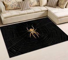 a living room area rug with a large spider on it's web in the center