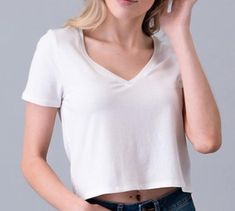 Solid, v-neck, short sleeve, crop top. 80% Rayon 15% Cotton 5% Spandex White V Neck Crop Top, Summer Cotton Cropped V-neck T-shirt, Trendy Fitted V-neck Top With Short Sleeves, Spring Trendy V-neck Cropped T-shirt, Trendy V-neck Cropped T-shirt For Summer, Casual V-neck Cropped T-shirt For Summer, Trendy V-neck Short Sleeve Top For Everyday, Fitted V-neck Cropped T-shirt For Summer, Cotton V-neck Cropped T-shirt For Summer