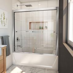 a bathroom with white tile and brown trim