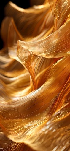 an abstract photograph of gold wavy hair