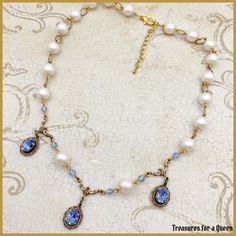 Feminine Victorian style meets elegant Regency glamour with a dash of Bridgerton inspiration in this beautiful Swarovski Crystal Elements Sapphire Blue Crystal and Pearl choker necklace.   *This necklace will be made just for you, Please allow 3-5 business days to ship. This elegant necklace is made with 8mm glass pearls in a light blush pink color connected with antique gold colored textured over links. The center of the necklace features 3 8x6mm Swarovski Crystal Elements faceted stones in a light Sapphire blue color. Each stone is in a prong brass setting that has been set in a Victorian style lace bezel setting and dangles from an antique gold colored connector. Small matching light Sapphire blue crystal beads brings all the element together. A truly beautiful necklace for a truly beau Regency Era Jewelry, Bridgerton Necklace, Bridgerton Jewelry, Feminine Things, Keychain Designs, Business Jewelry, Plant Diy, Jewelry Sapphire, Light Blush Pink