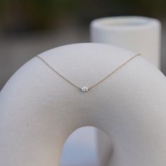 The Sam Necklace is the perfect dainty necklace for sophistication and fun. It's intentionally petite so you never have to take it off, while also being the perfect staple necklace you can layer with chains, crosses, or other diamond styles. It features a .25 carat oval diamond, measuring about 5mm x 3.5mm. It sits in a custom-designed invisible setting, and is fixed horizontally on a dainty 16-18" adjustable chain. Use code "SAMCIACCIA" at checkout for free shipping, and for an automatic contri Staple Necklace, Cool Skin Tone, Diamond Fashion, Dainty Necklace, Oval Diamond, 10k Gold, Good Skin, Lab Grown Diamonds, My Jewellery