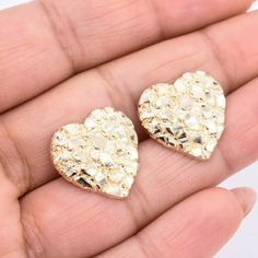 "3/4\" Heart Shaped Nugget Textured Stud Earrings Real Solid 10K Yellow Gold * Metal : Real 10K Yellow Gold (Properly Stamped, 10K) * Condition : Brand New * Finish : Polished * Avg Weight : 3.15 grams * Length : 19mm = Just over 3/4\" * Width : 18.8mm = 3/4\" * Clasp/Bail : Push Back All of our items are brand new and are shipped with a gift box." Gold Heart Earrings Diamond Cut Gift, 14k Gold Diamond Cut Heart Earrings, Earrings Real, Herringbone Necklace, Mexican Jewelry, Stacked Jewelry, Luck Charms, Gold Shimmer, Gold Price