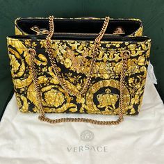 See Last Photo For The Description Comes With Dust Bag And Tag Measurements W 10 H 7 High-end Gold Shopping Bag, Luxury Yellow Rectangular Shoulder Bag, Luxury Yellow Rectangular Bags, Luxury Yellow Shopping Bag, Luxury Yellow Tote Bag, Designer Yellow Gold Bags With Gold-tone Hardware, High-end Gold Tote Shoulder Bag, Luxury Yellow Shoulder Bag For Shopping, High-end Gold Tote Bag